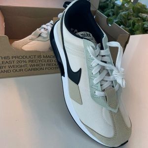 Adidas canvas shoes. Size 9.5 or 7 in men. Never worn. New in box.